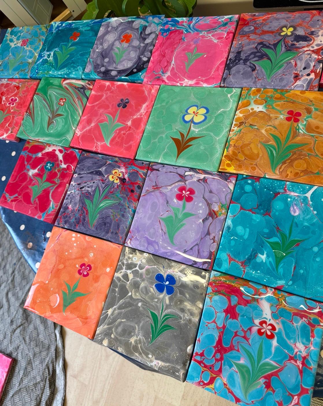 Marbled canvas artworks with hand-painted flowers